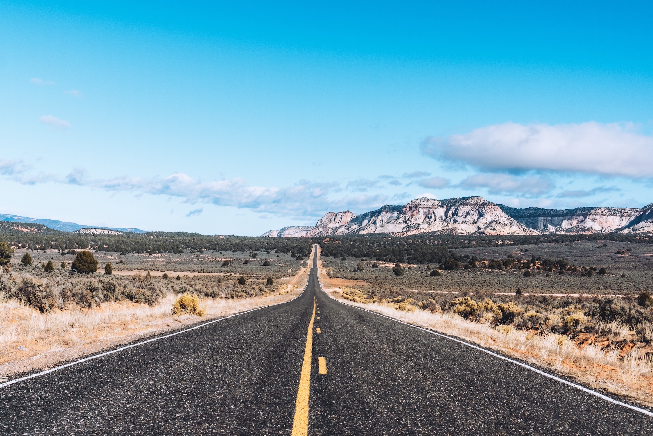 road-leading-to-mountains-in-the-western-united-st-2023-11-27-05-35-54-utc